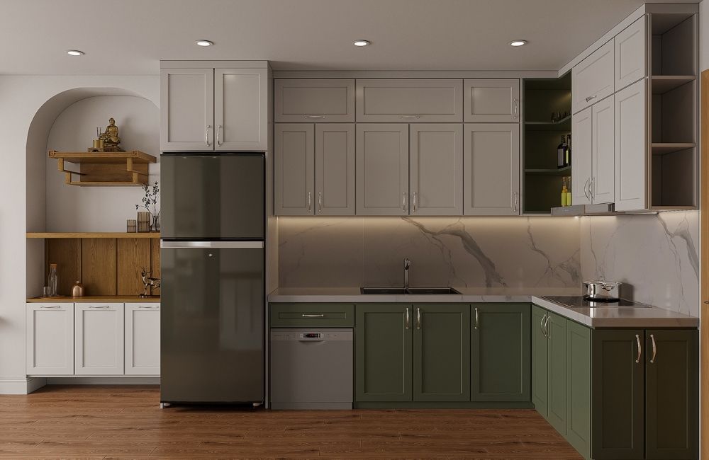 Modern kitchen design in Colorado Springs featuring white and gray cabinetry, green accents, and a stainless steel refrigerator