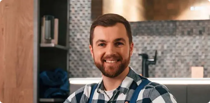 DreamMaker Bath & Kitchen field supervisor smiling confidently in Colorado Springs