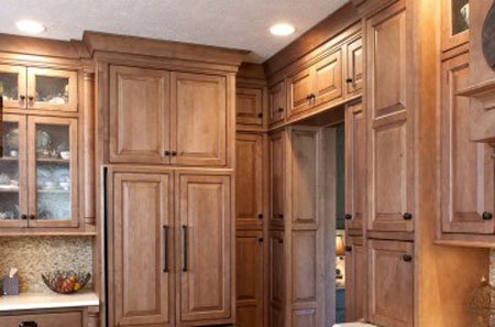 Refaced kitchen cabinets in Lake Norman featuring custom doors, updated hardware, and a refreshed design