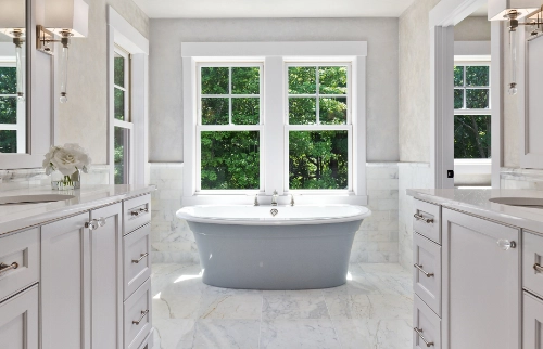 Luxurious bathroom remodel in South Valley featuring a freestanding tub and double vanity by DreamMaker Bath & Kitchen.