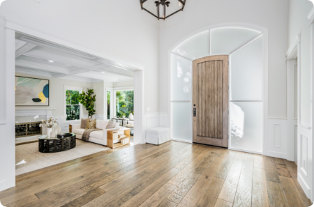 Bright, open entryway in St. Louis Park, featuring a wide doorway and hardwood floors for accessible living