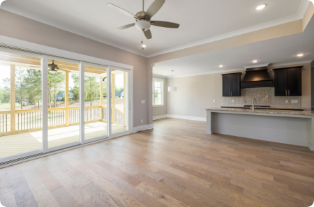 Spacious kitchen and living area in St. Louis Park, with wide doorways, an open floor plan, and natural light